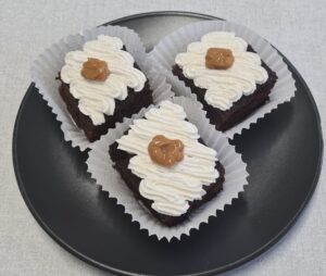 Chocolate cake with caramel and cream