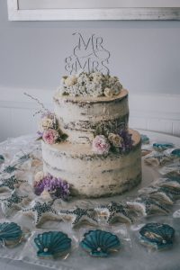2 Tier gluten free carrot wedding cake with matching beach theme cookies