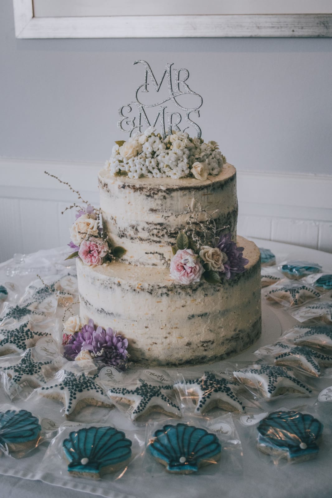 2 Tier gluten free carrot wedding cake with matching beach theme cookies