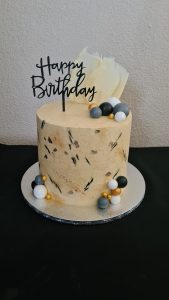 60th Birthday celebration beige, gold and black cake