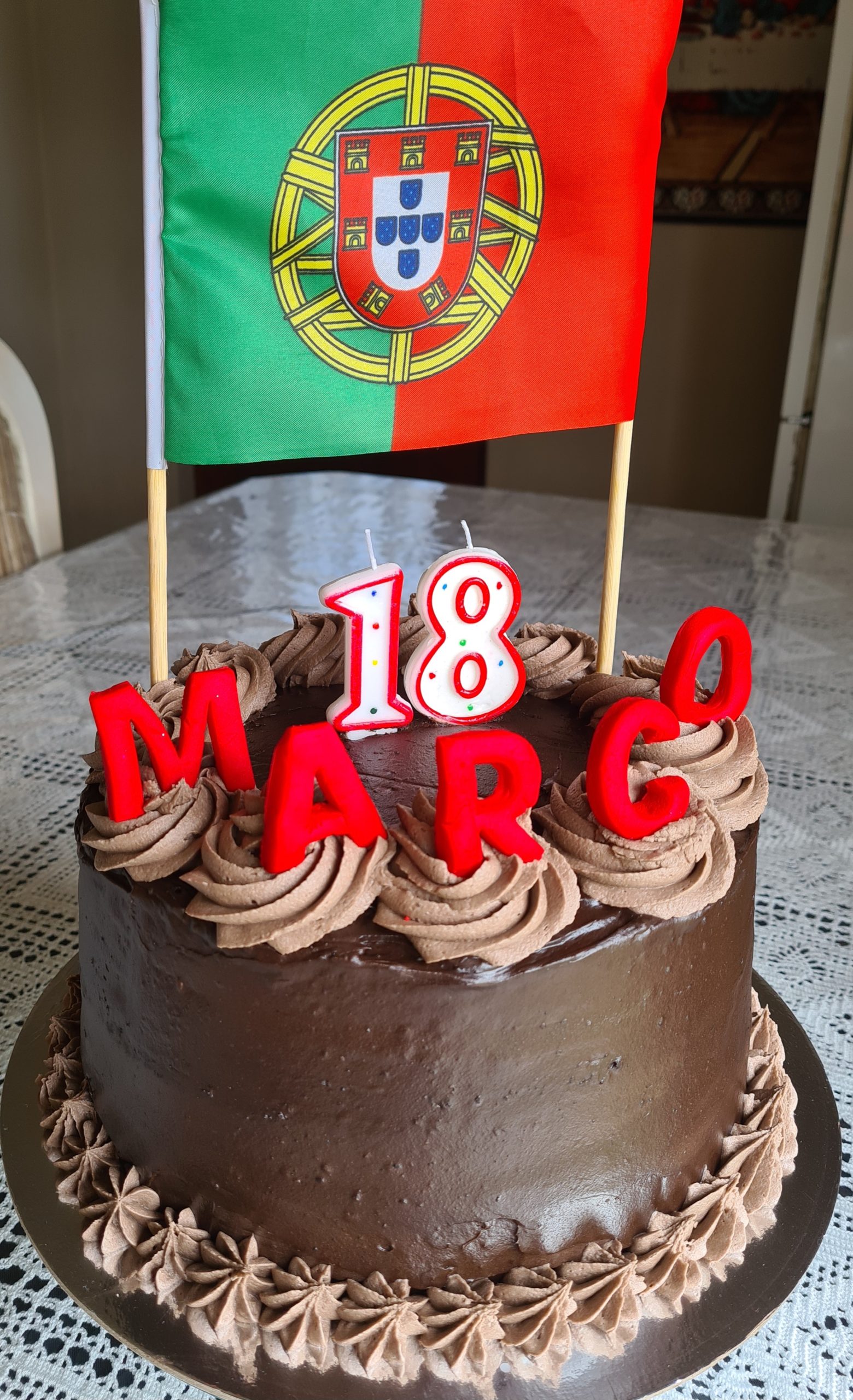 Chocolate sponge portugal theme cake with chocolate buttercream