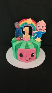 Coco melon theme 1st birthday cake