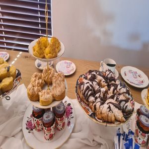 Milktarts, Lemon meringue, cupcakes and chocolate croissants display