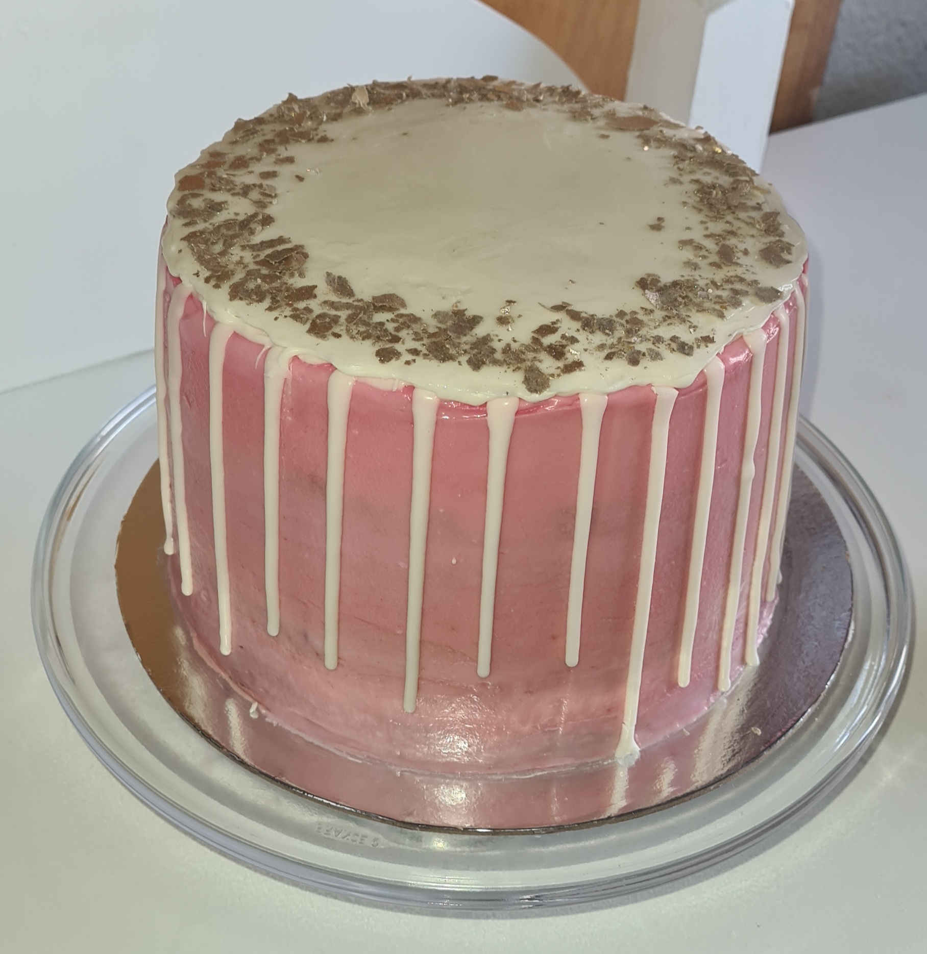Pink with white chocolate drip birthday cake