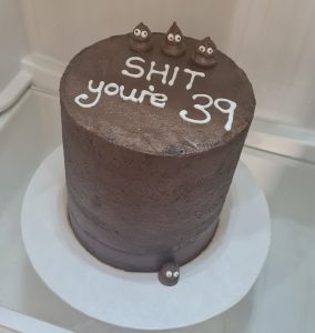 Poop emoji theme 39th birthday cake