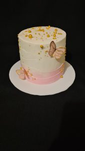 White and pink butterflies birthday cake