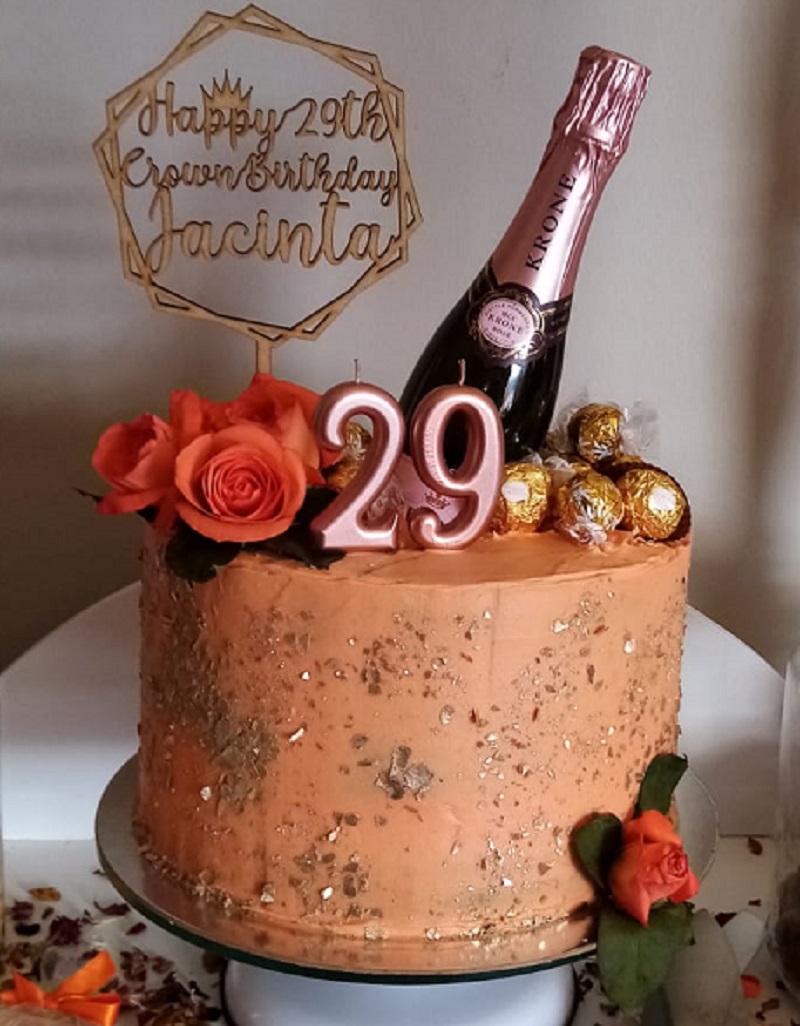 29th Crown birthday multilayered cake with fresh orange roses and champagne bottle and custom made topper (2)