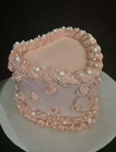 Pink heart shaped Birthday cake